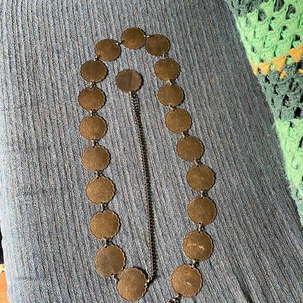 Vintage metal belt. This belt has been around, I just think it is totally cool!